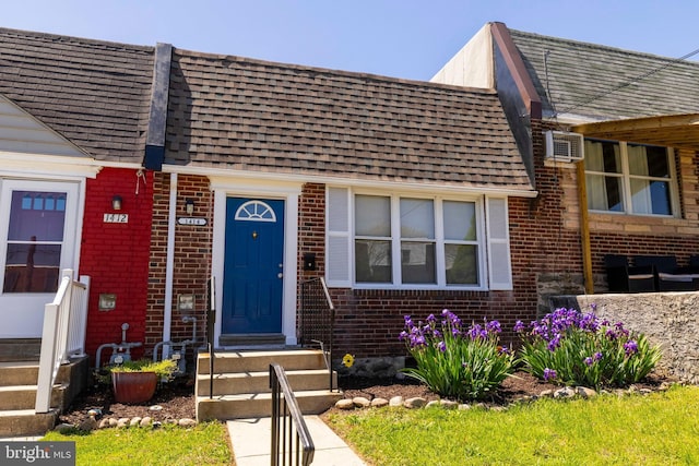 1414 Simpson St, Marcus Hook, PA 19061 - view of front of house featuring brick siding and roof with shingles