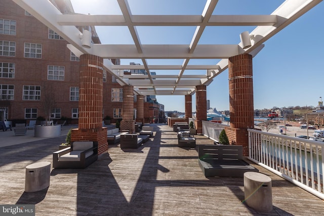 250 President St Unit 308, Baltimore, MD 21202 - exterior space featuring a pergola and an outdoor hangout area