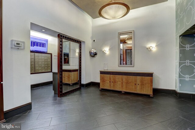 250 President St Unit 308, Baltimore, MD 21202 - interior space featuring baseboards and mail area