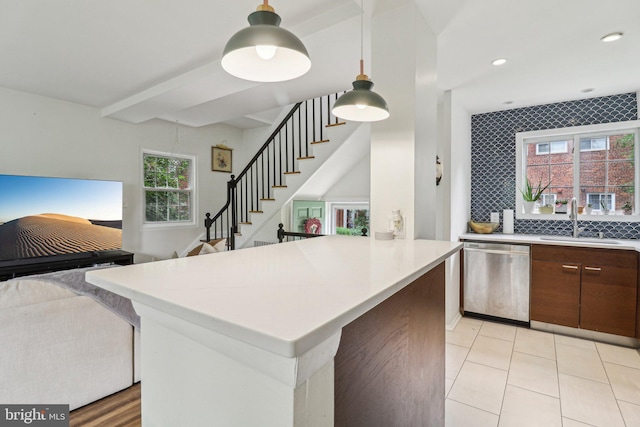 1240 Martha Custis Dr, Alexandria, VA 22302 - kitchen featuring dishwasher, a sink, light countertops, open floor plan, and recessed lighting