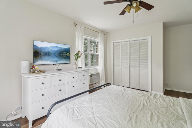 1240 Martha Custis Dr, Alexandria, VA 22302 - bedroom featuring a wall mounted air conditioner, dark wood finished floors, a closet, and baseboards