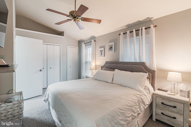 602 Lions Gate Ln, Odenton, MD 21113 - carpeted bedroom featuring ceiling fan, lofted ceiling, and multiple closets