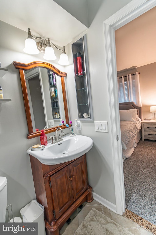 602 Lions Gate Ln, Odenton, MD 21113 - ensuite bathroom featuring tile patterned flooring, toilet, ensuite bathroom, and vanity