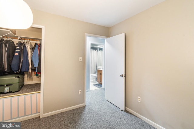 602 Lions Gate Ln, Odenton, MD 21113 - unfurnished bedroom with baseboards, a closet, and carpet