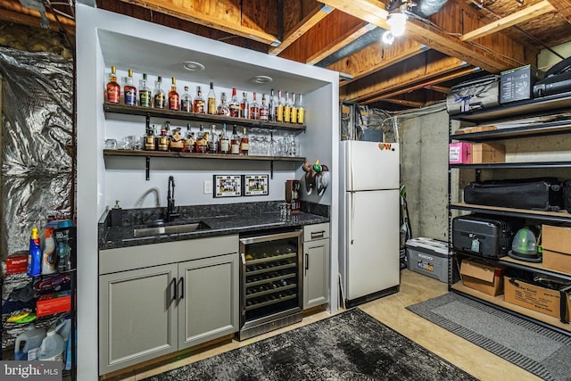602 Lions Gate Ln, Odenton, MD 21113 - bar featuring concrete floors, beverage cooler, a sink, freestanding refrigerator, and wet bar