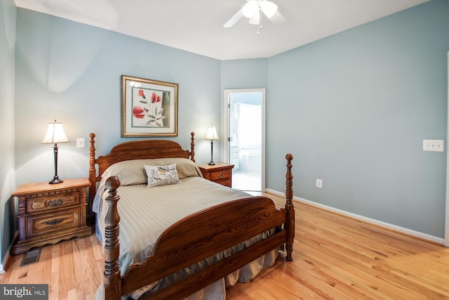 bedroom featuring baseboards, a ceiling fan, light wood-style flooring, and visible vents