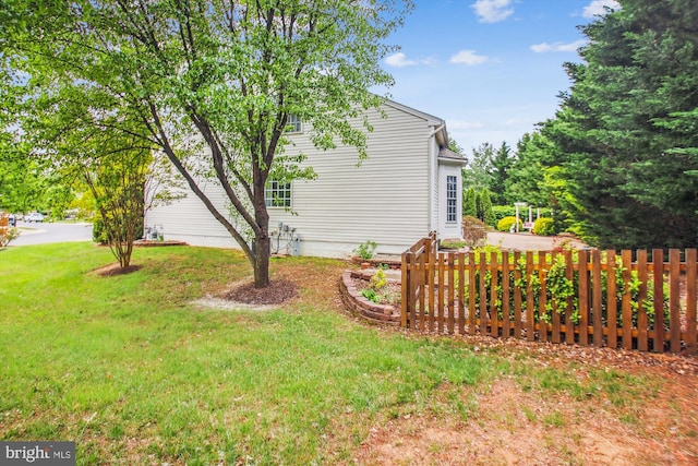 view of yard featuring fence