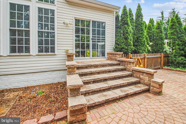 exterior space featuring a patio and fence
