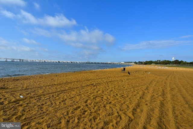 property view of water featuring a view of the beach