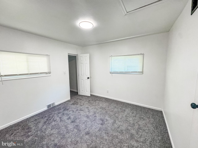 21 Onaway Pl, New Castle, DE 19720 - unfurnished bedroom with carpet flooring, baseboards, visible vents, and multiple windows
