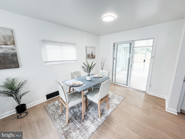 21 Onaway Pl, New Castle, DE 19720 - dining room featuring baseboards and light wood-style flooring