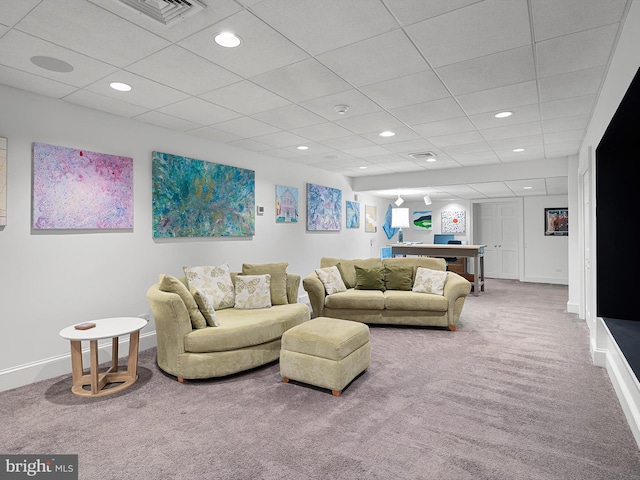 living room with a paneled ceiling, visible vents, baseboards, carpet flooring, and recessed lighting