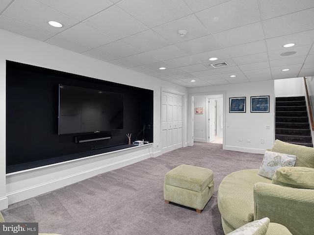 living area with visible vents, stairway, baseboards, carpet flooring, and recessed lighting