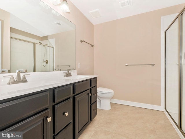 2004 Quandary Dr, Frederick, MD 21702 - bathroom featuring double vanity, visible vents, tile patterned flooring, a shower stall, and a sink