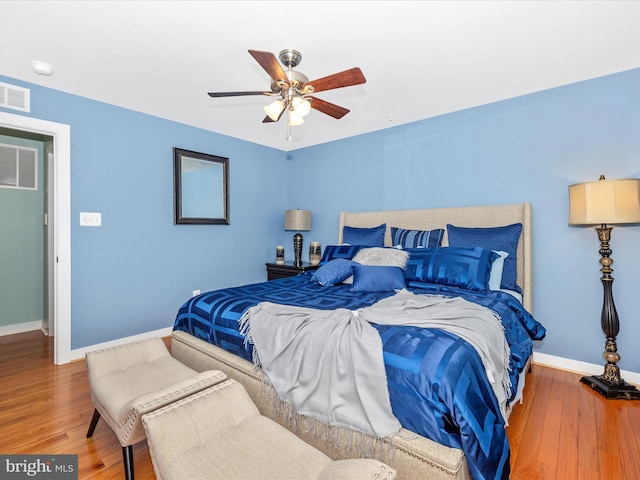 2004 Quandary Dr, Frederick, MD 21702 - bedroom featuring baseboards, a ceiling fan, wood finished floors, and visible vents