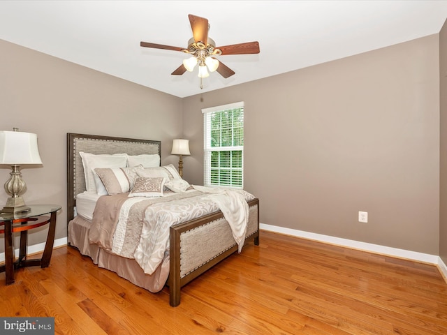 2004 Quandary Dr, Frederick, MD 21702 - bedroom featuring a ceiling fan, baseboards, and light wood-style flooring