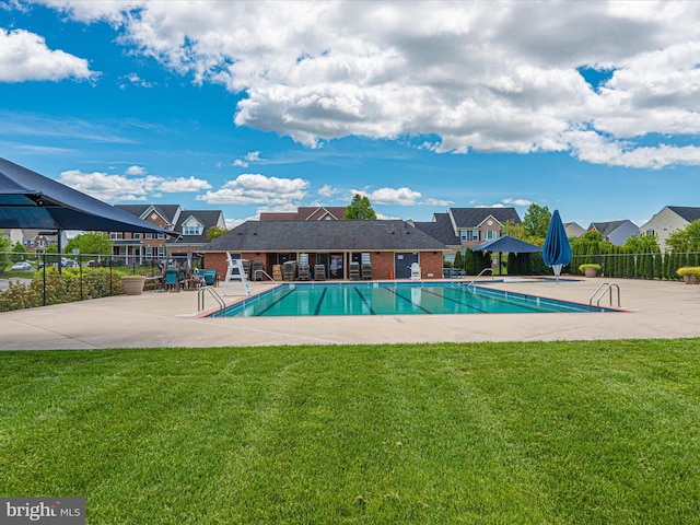 2004 Quandary Dr, Frederick, MD 21702 - pool featuring a lawn, fence, a residential view, and a patio area