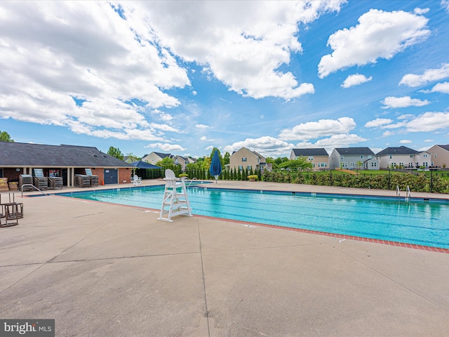 2004 Quandary Dr, Frederick, MD 21702 - community pool with fence, a patio area, and a residential view