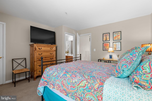 carpeted bedroom with baseboards