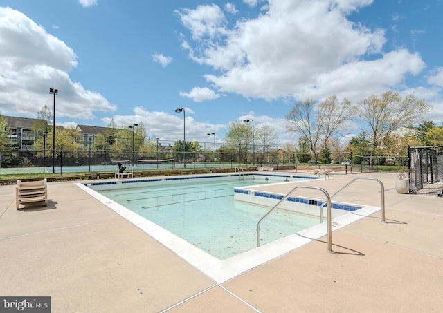 community pool with fence