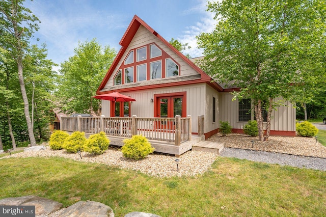 193 Greenbrier Dr, Mc Henry, MD 21541 - back of property with french doors, a wooden deck, and a yard
