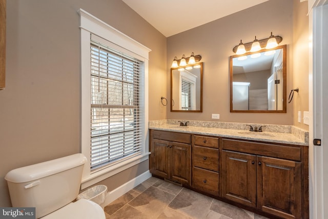 193 Greenbrier Dr, Mc Henry, MD 21541 - full bath with baseboards, a sink, double vanity, and toilet