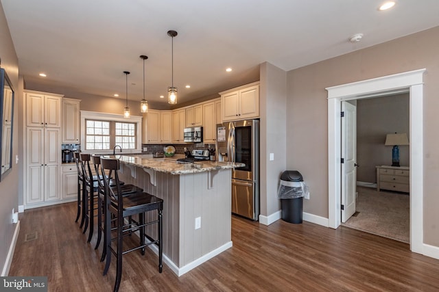 193 Greenbrier Dr, Mc Henry, MD 21541 - kitchen featuring a center island, appliances with stainless steel finishes, a breakfast bar, and dark wood-type flooring