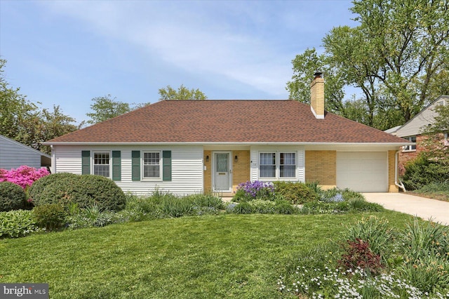 ranch-style home featuring brick siding, a garage, a front yard, a chimney, and concrete driveway