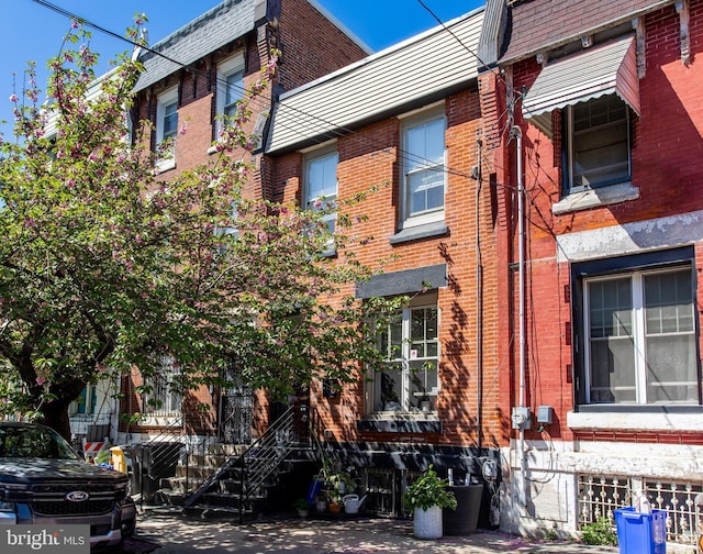 2325 W Thompson St, Philadelphia, PA 19121 - view of side of home with brick siding