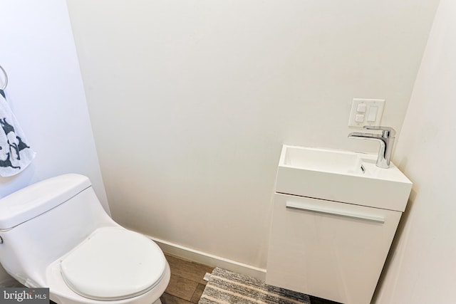 2325 W Thompson St, Philadelphia, PA 19121 - half bathroom featuring vanity and toilet