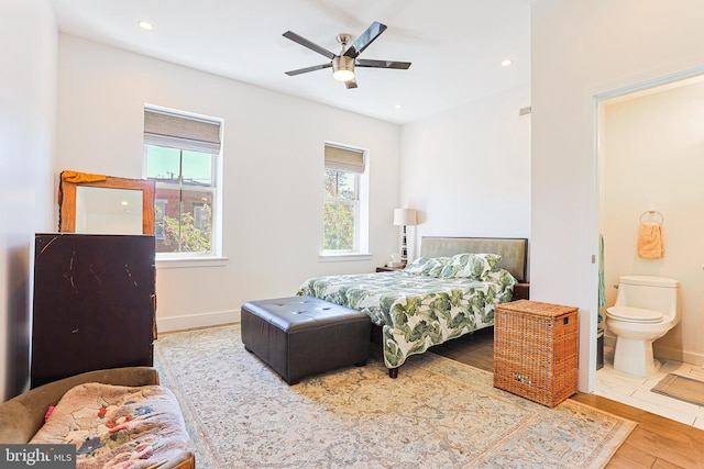 2325 W Thompson St, Philadelphia, PA 19121 - bedroom with recessed lighting, multiple windows, wood finished floors, and ensuite bath