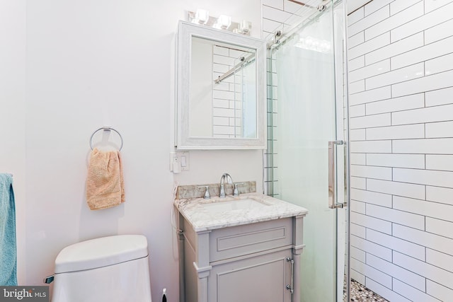 2325 W Thompson St, Philadelphia, PA 19121 - bathroom featuring toilet, a shower stall, and vanity