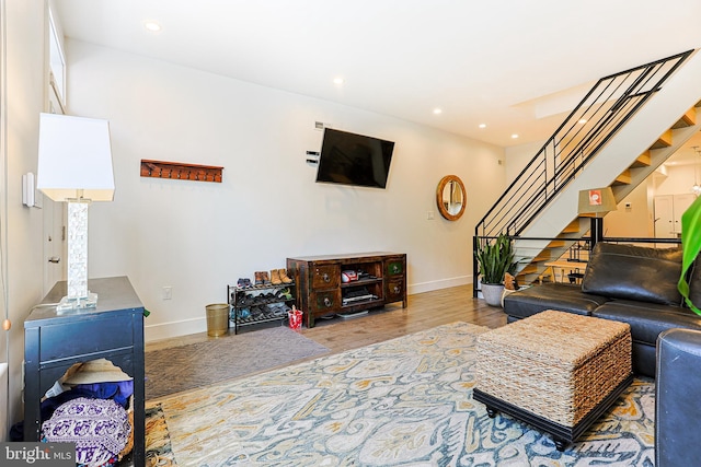 2325 W Thompson St, Philadelphia, PA 19121 - living room featuring recessed lighting, baseboards, stairs, and wood finished floors