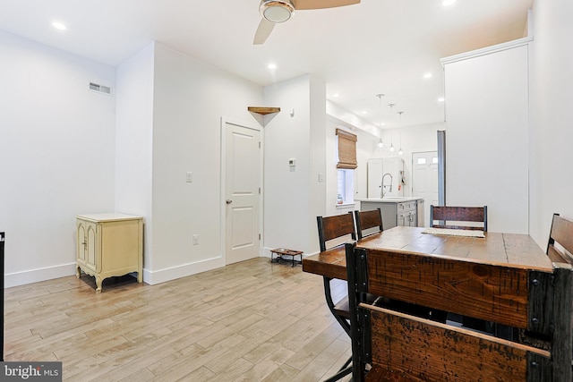 2325 W Thompson St, Philadelphia, PA 19121 - home office featuring a sink, light wood finished floors, a ceiling fan, recessed lighting, and visible vents