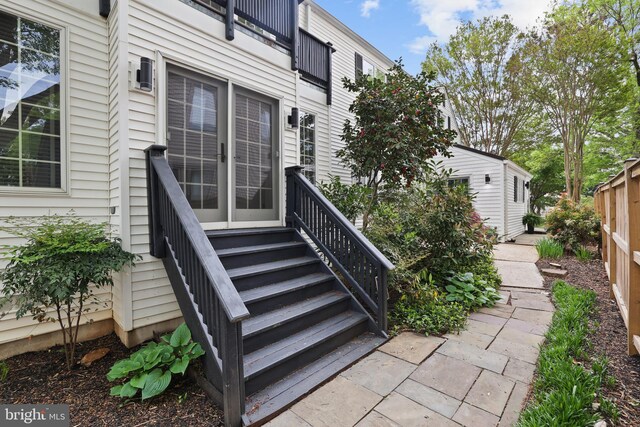 doorway to property with a balcony