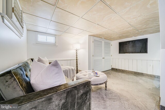 4817 Chevy Chase Blvd, Chevy Chase, MD 20815 - living area with a wainscoted wall and marble finish floors