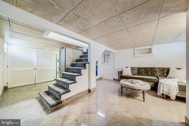 4817 Chevy Chase Blvd, Chevy Chase, MD 20815 - living room featuring stairs and baseboards