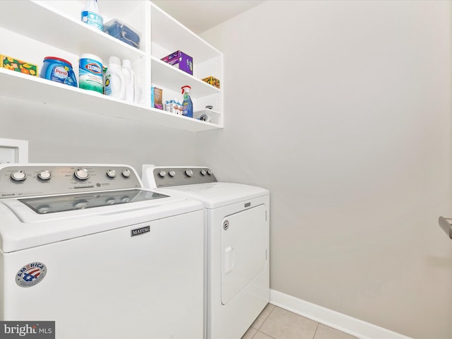 5303 Crape Myrtle Dr, Frederick, MD 21703 - washroom with washing machine and dryer, light tile patterned floors, and baseboards