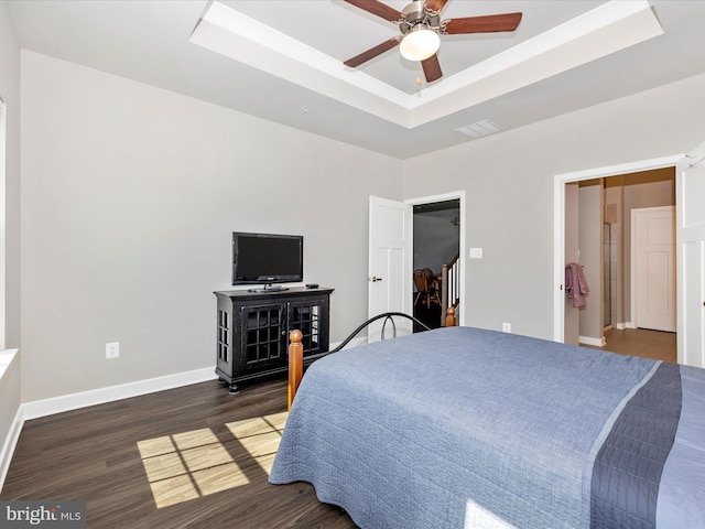 5303 Crape Myrtle Dr, Frederick, MD 21703 - bedroom featuring a raised ceiling, wood finished floors, baseboards, and ceiling fan