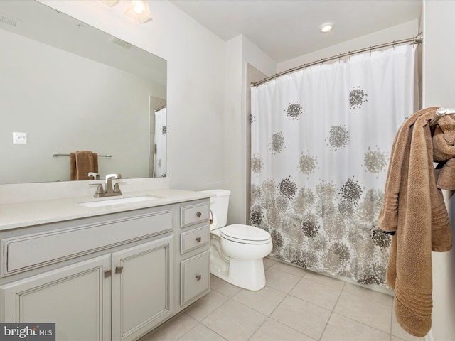 5303 Crape Myrtle Dr, Frederick, MD 21703 - full bath with tile patterned flooring, vanity, toilet, and a shower with shower curtain