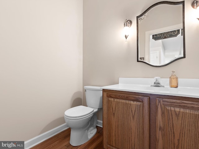 345 Jessica Dr, Middletown, DE 19709 - half bath featuring baseboards, wood finished floors, toilet, and vanity