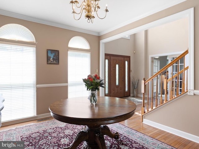 345 Jessica Dr, Middletown, DE 19709 - entryway with plenty of natural light, wood finished floors, and an inviting chandelier