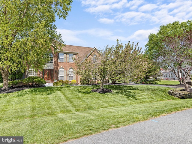 345 Jessica Dr, Middletown, DE 19709 - view of front facade featuring a front lawn and brick siding
