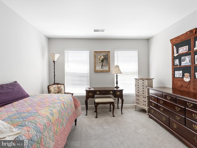 345 Jessica Dr, Middletown, DE 19709 - bedroom with baseboards, visible vents, and light carpet