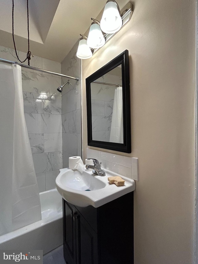 577 Snowden Rd, Upper Darby, PA 19082 - full bathroom with vanity, shower / bath combo, and tasteful backsplash