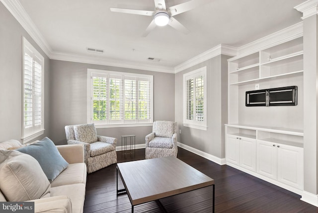living area with baseboards, dark wood-style floors, and visible vents