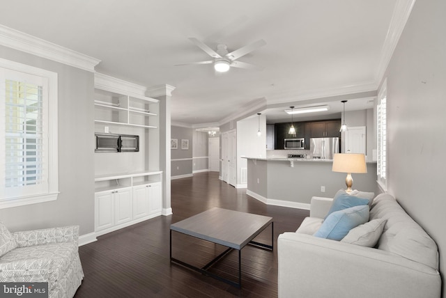 living area featuring ornamental molding, a ceiling fan, and dark wood-style floors