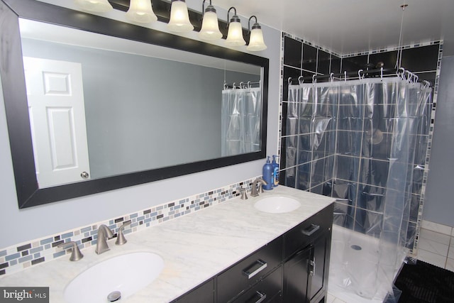 full bath with double vanity, a sink, decorative backsplash, and a shower with shower curtain