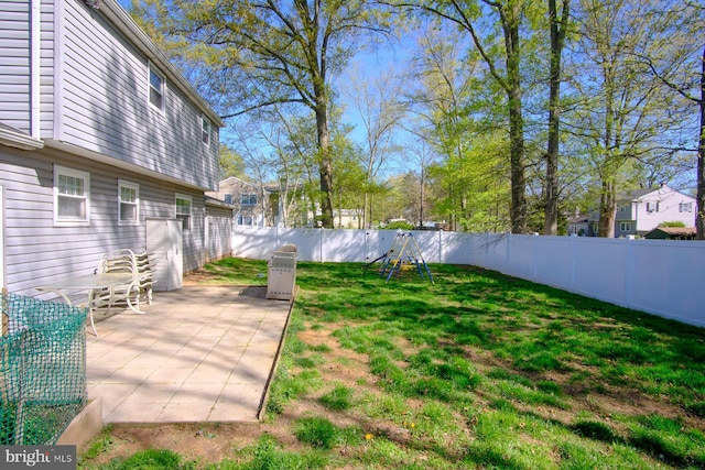 view of yard with a fenced backyard and a patio area