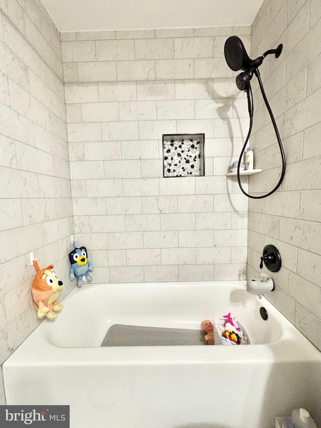 bathroom featuring bathing tub / shower combination